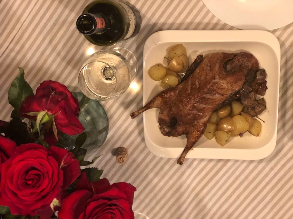 Crispy roast duck with baked potatoes